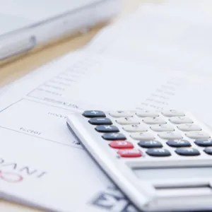 calculator sitting on an invoice