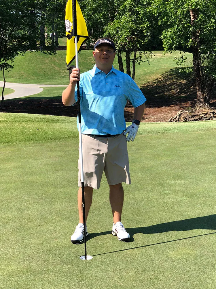 Dr Rose golfing